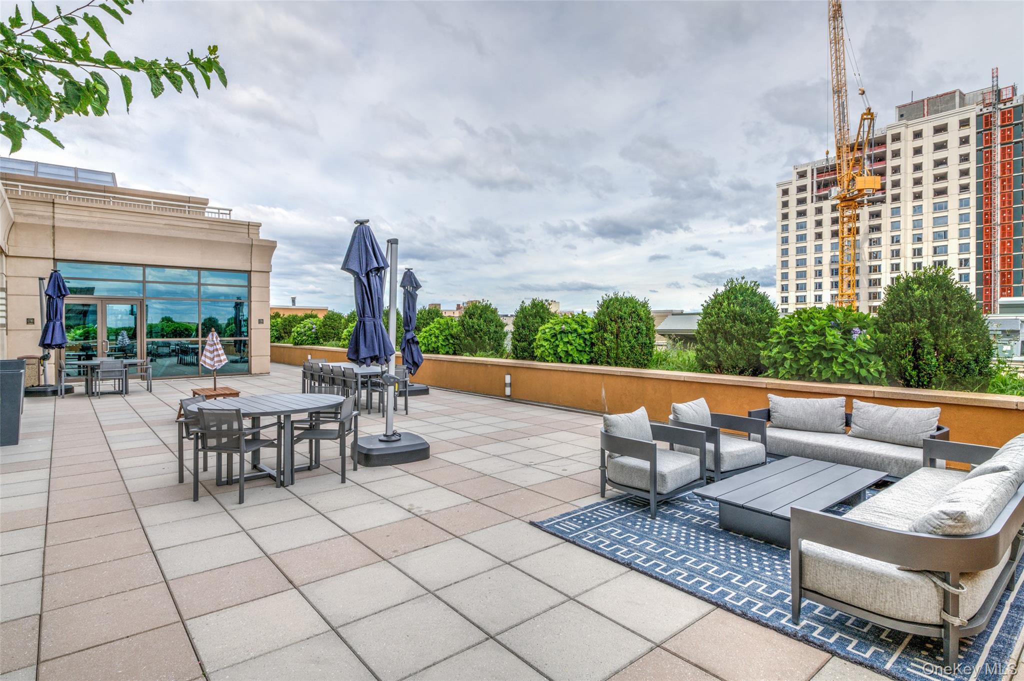 175 Huguenot Street, Unit 1401 New Rochelle, NY 10801 - Photo 24 of 29 a view of outdoor space with seating