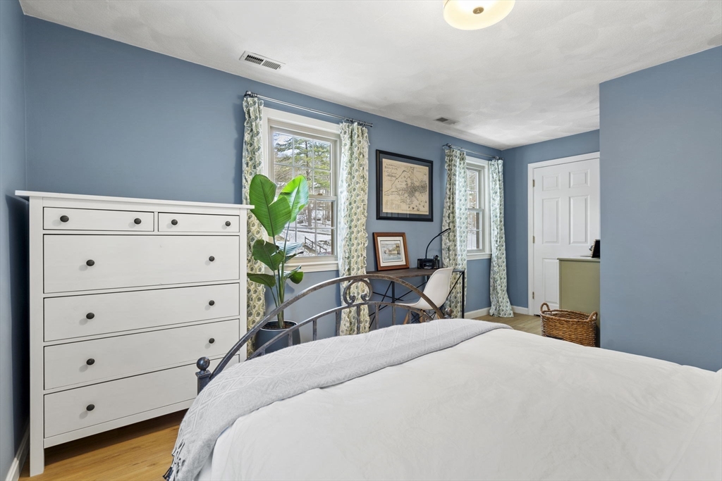 4 Apple Ridge Road, Unit 6 Maynard, MA 01754 - Photo 19 of 40 a bedroom with a bed and a dresser