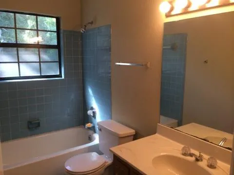a bathroom with a sink and bathtub