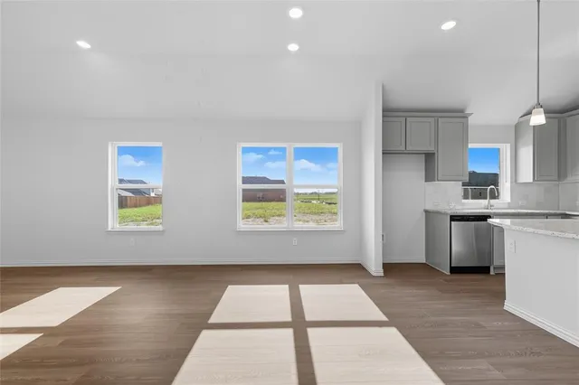 a view of kitchen with furniture and window