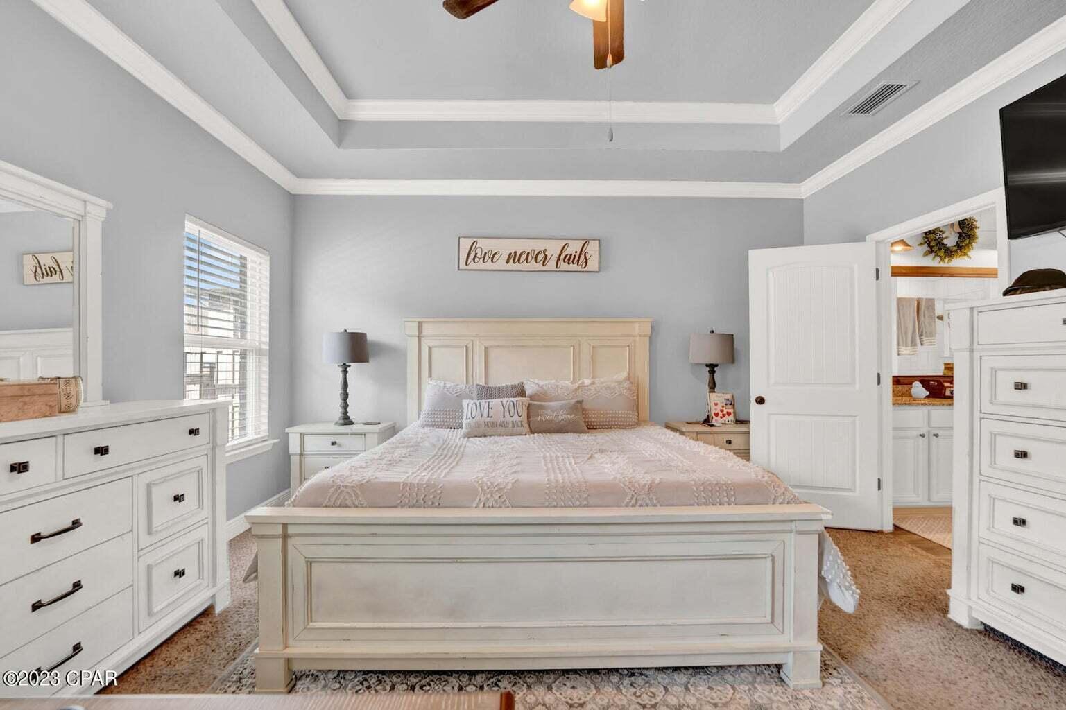 622 Cornelia Street Freeport, FL 32439 - Photo 13 of 43 a bedroom with a bed and furniture