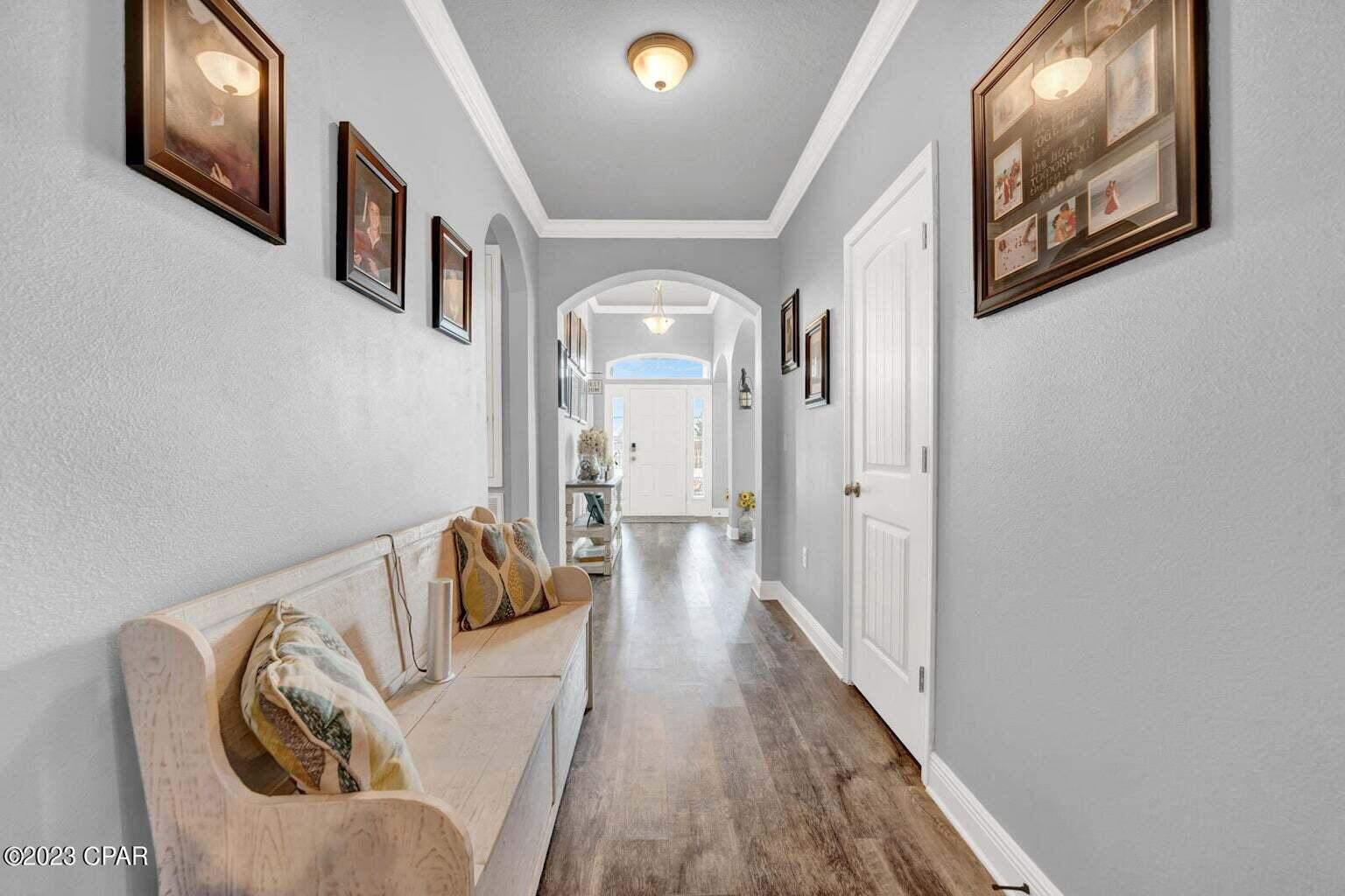 622 Cornelia Street Freeport, FL 32439 - Photo 17 of 43 a view of entryway with wooden floor