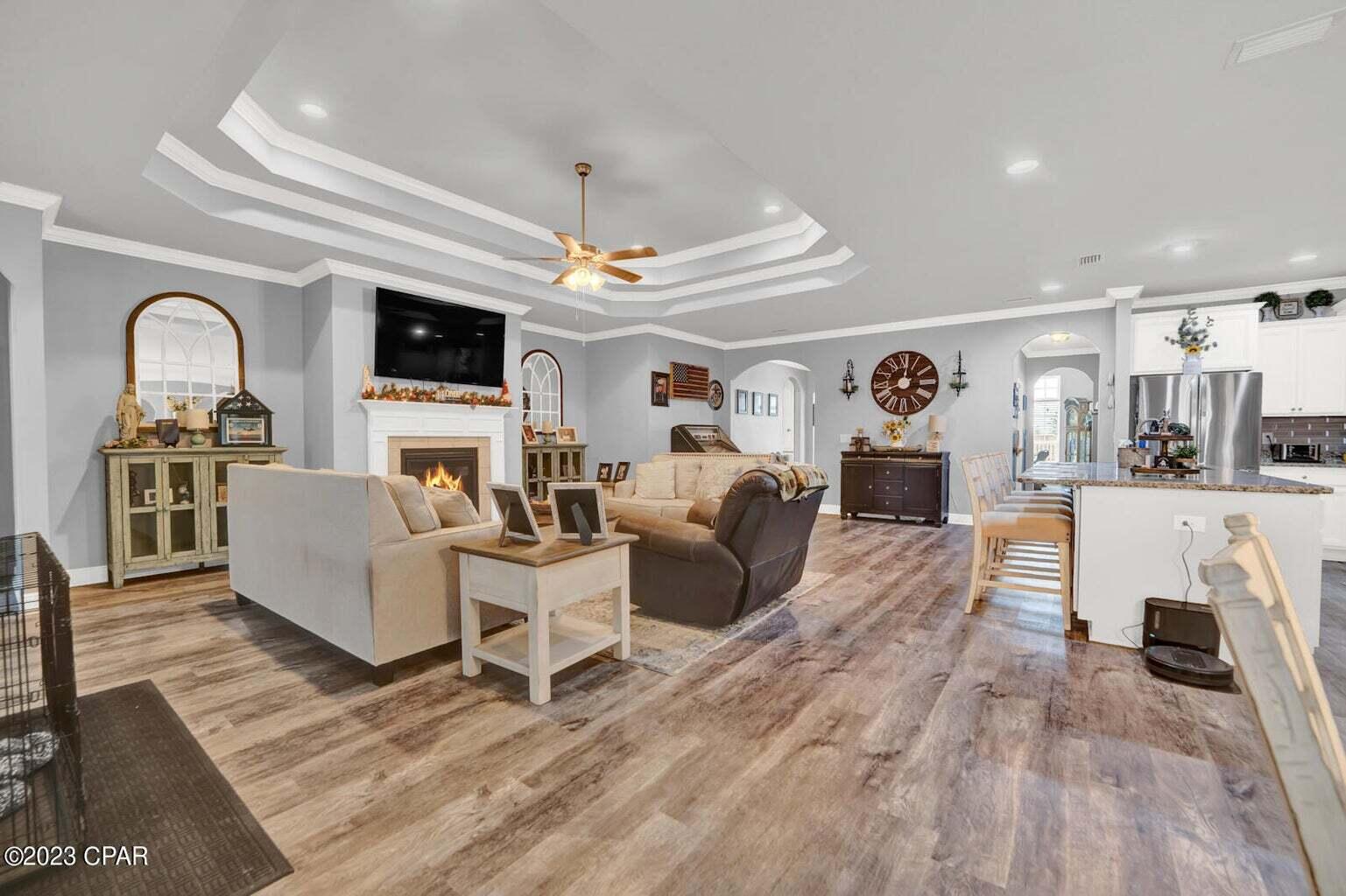 622 Cornelia Street Freeport, FL 32439 - Photo 2 of 43 a living room with furniture and a fireplace