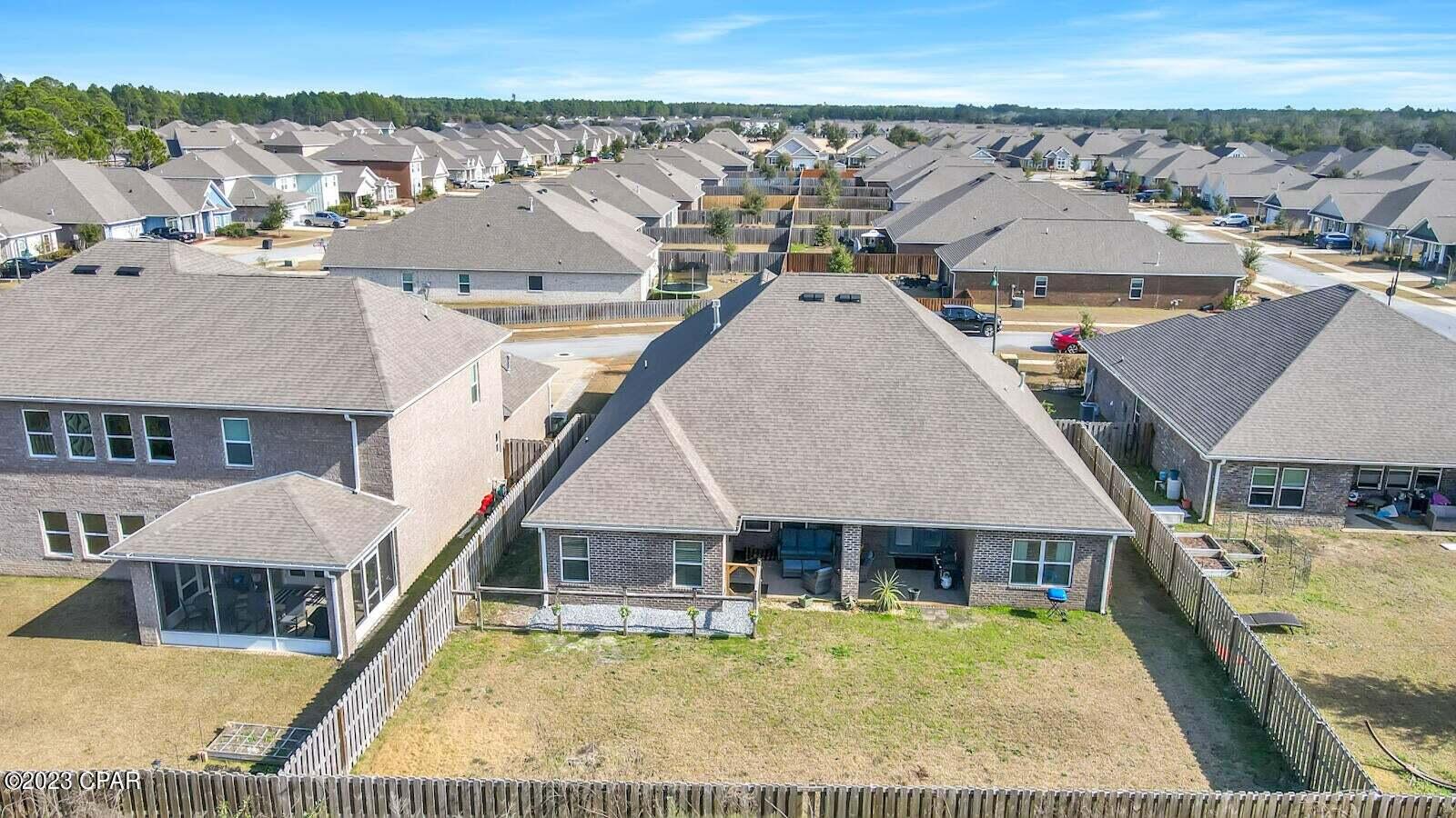 622 Cornelia Street Freeport, FL 32439 - Photo 43 of 43 an aerial view of a house with swimming pool