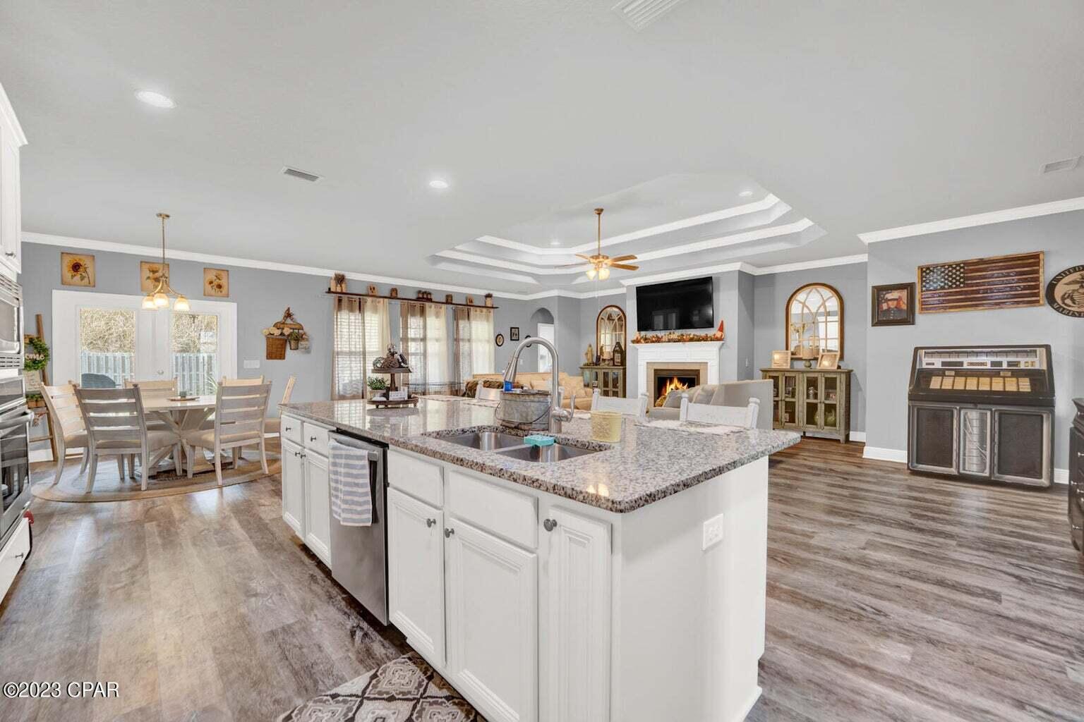 622 Cornelia Street Freeport, FL 32439 - Photo 6 of 43 a kitchen with stainless steel appliances granite countertop lots of counter top space