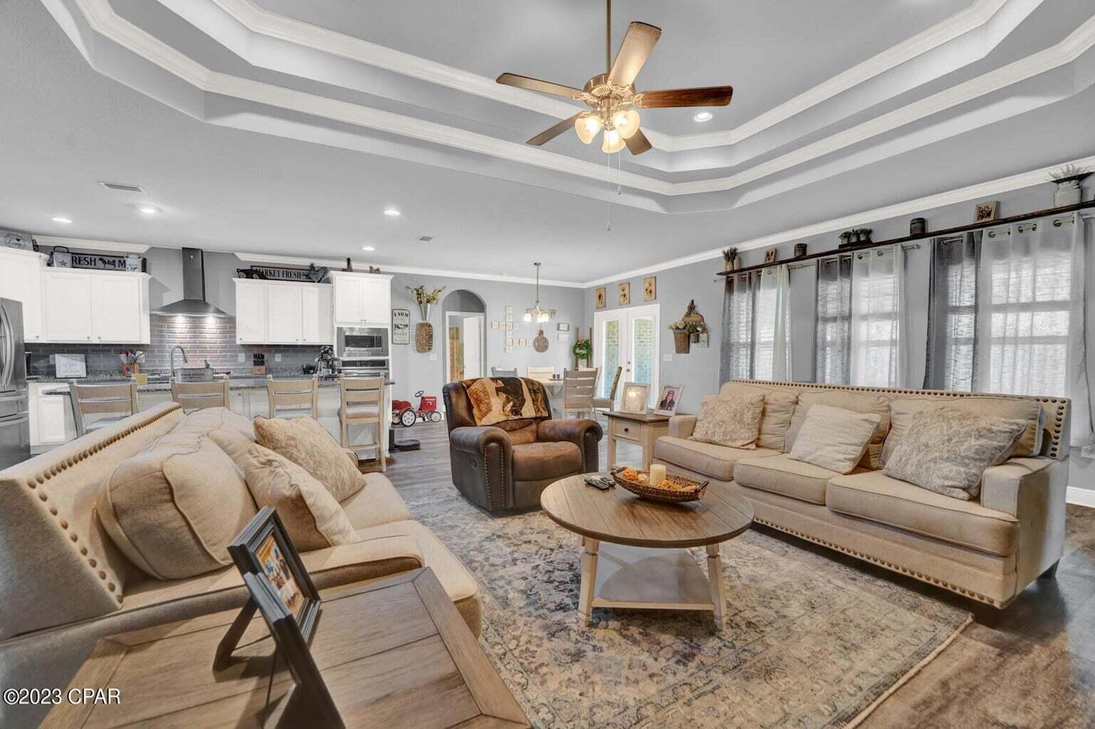 622 Cornelia Street Freeport, FL 32439 - Photo 9 of 43 a living room with furniture and a view of kitchen