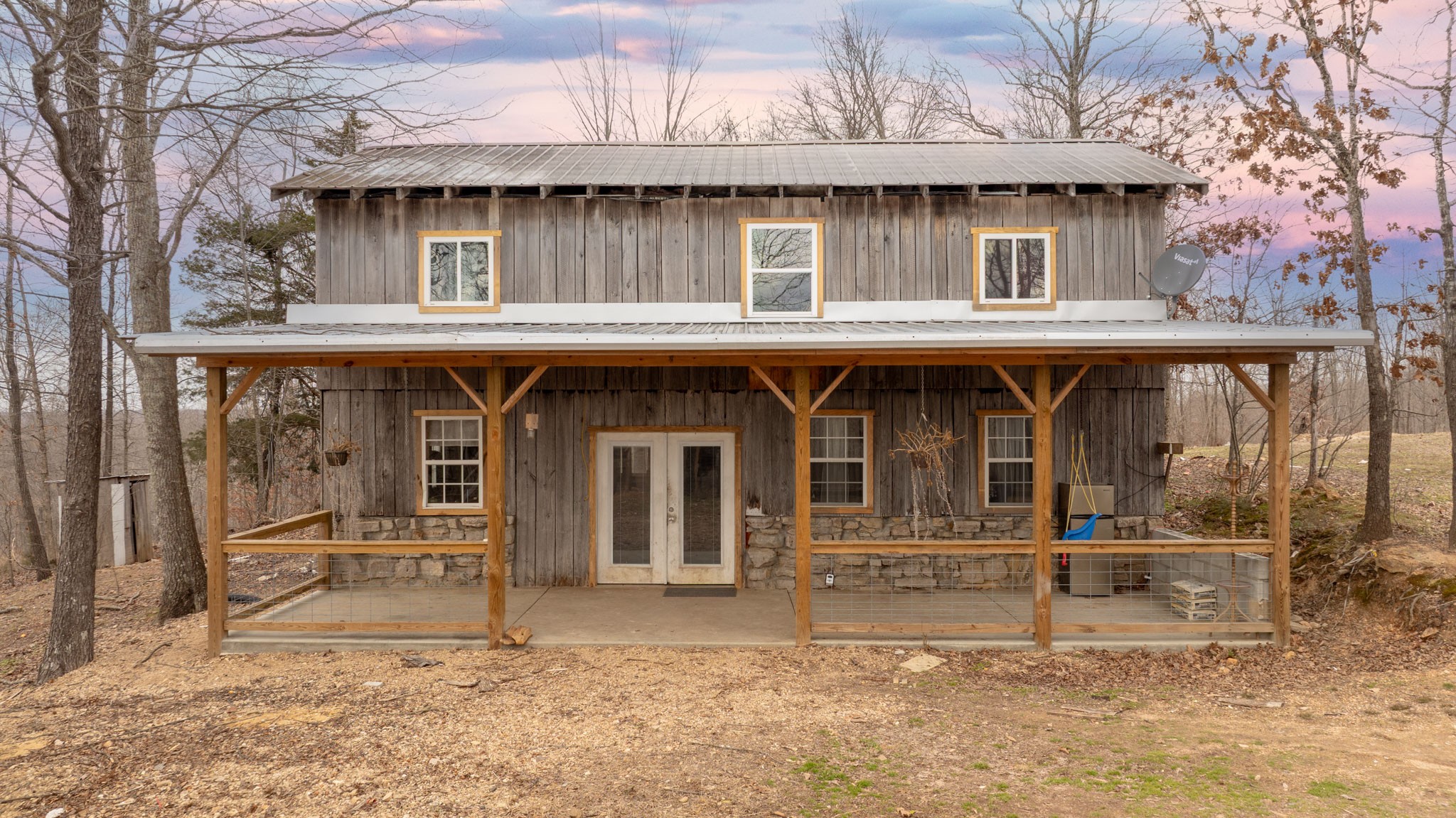 a front view of a house with a porch