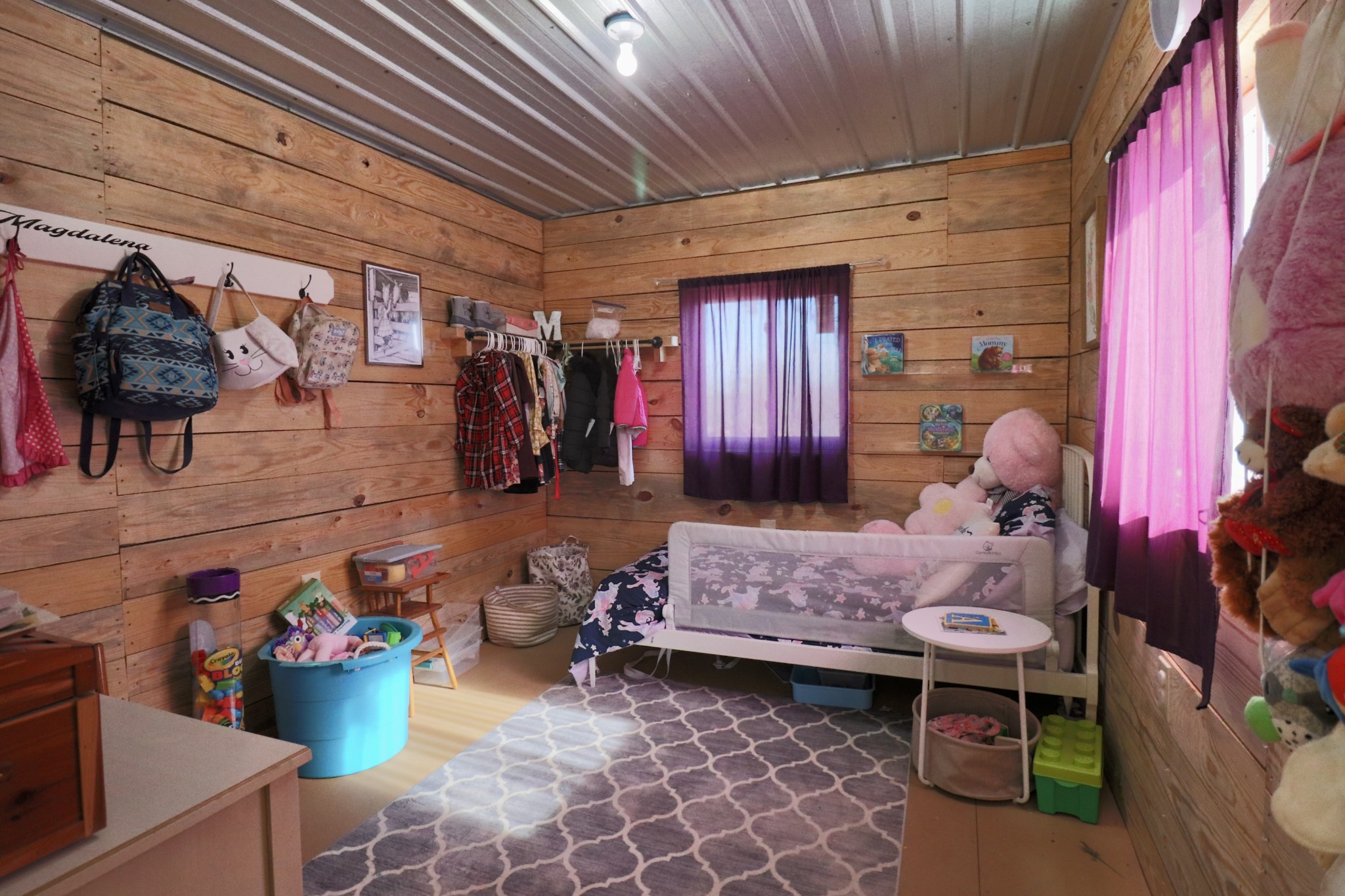 4561 Mayberry Prong Road Linden, TN 37096 - Photo 19 of 27 a room with lots of furniture and a rug