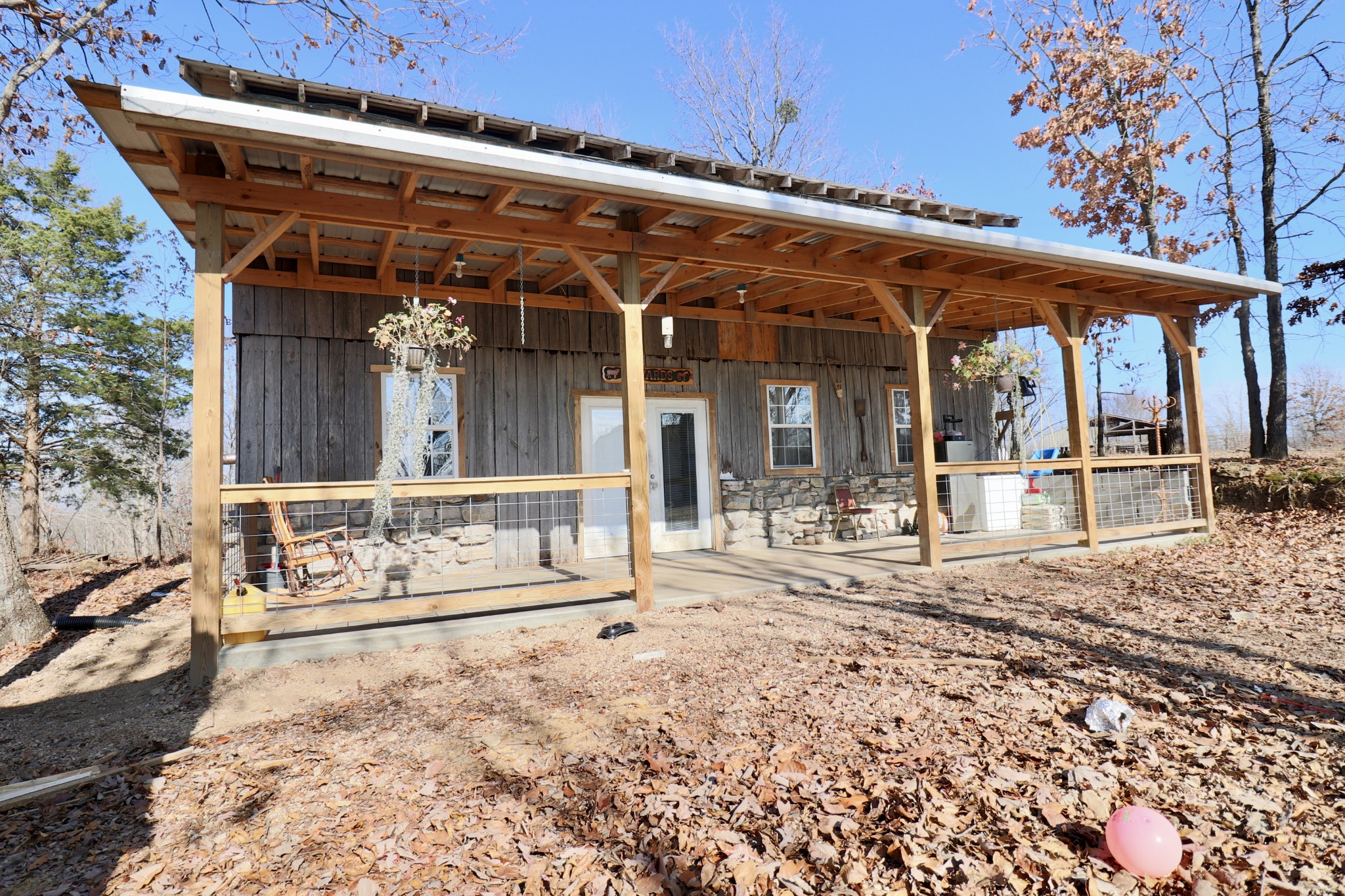 4561 Mayberry Prong Road Linden, TN 37096 - Photo 2 of 27 a view of a chairs and table in the patio