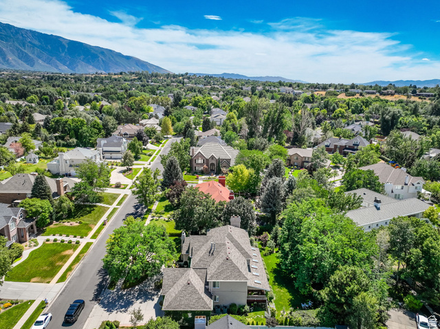 7740 Keswick Road Sandy, UT 84093 - Photo 73 of 74 Expansive residential area featuring established homes, mature trees, and paved streets