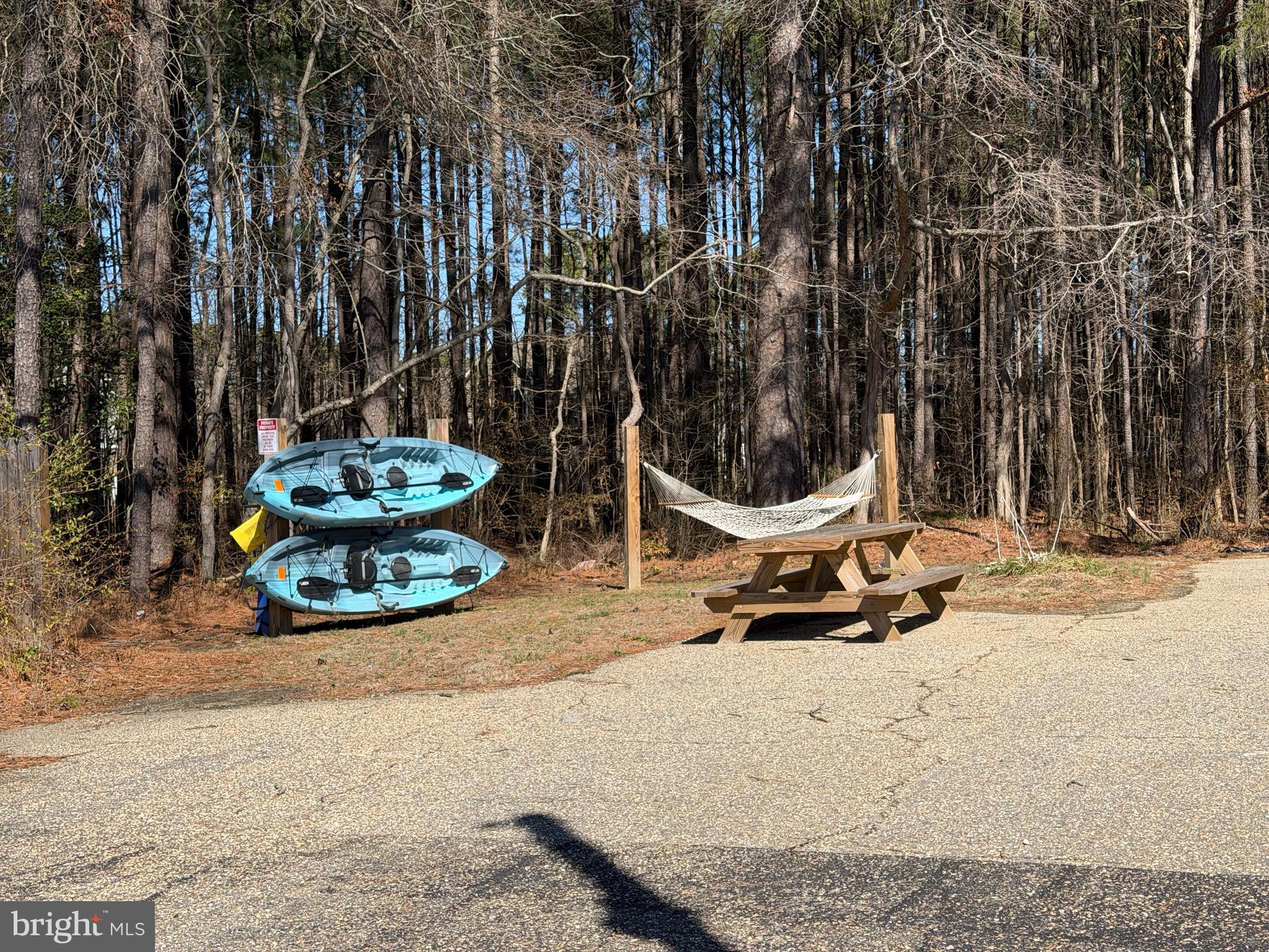17476 Piney Point Road, Unit 12 Piney Point, MD 20690 - Photo 9 of 10 an outdoor space with furniture and garden
