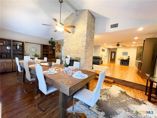 a view of a dining room with furniture
