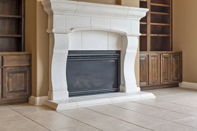 a view of a utility room with a fireplace
