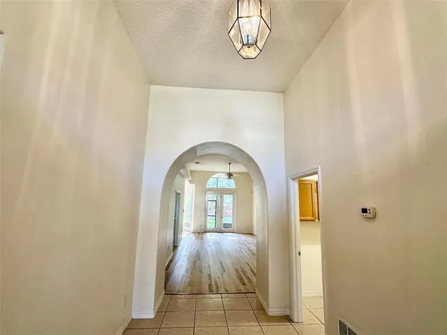 a view of a livingroom with windows