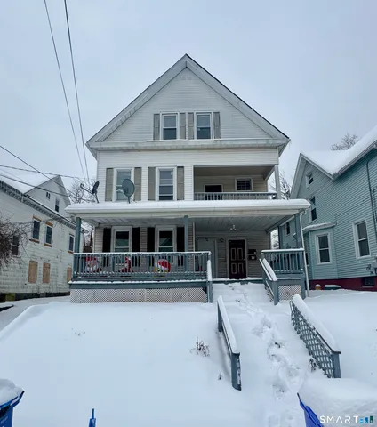 a front view of a house with porch