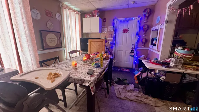 a view of kitchen filled with furniture and toys
