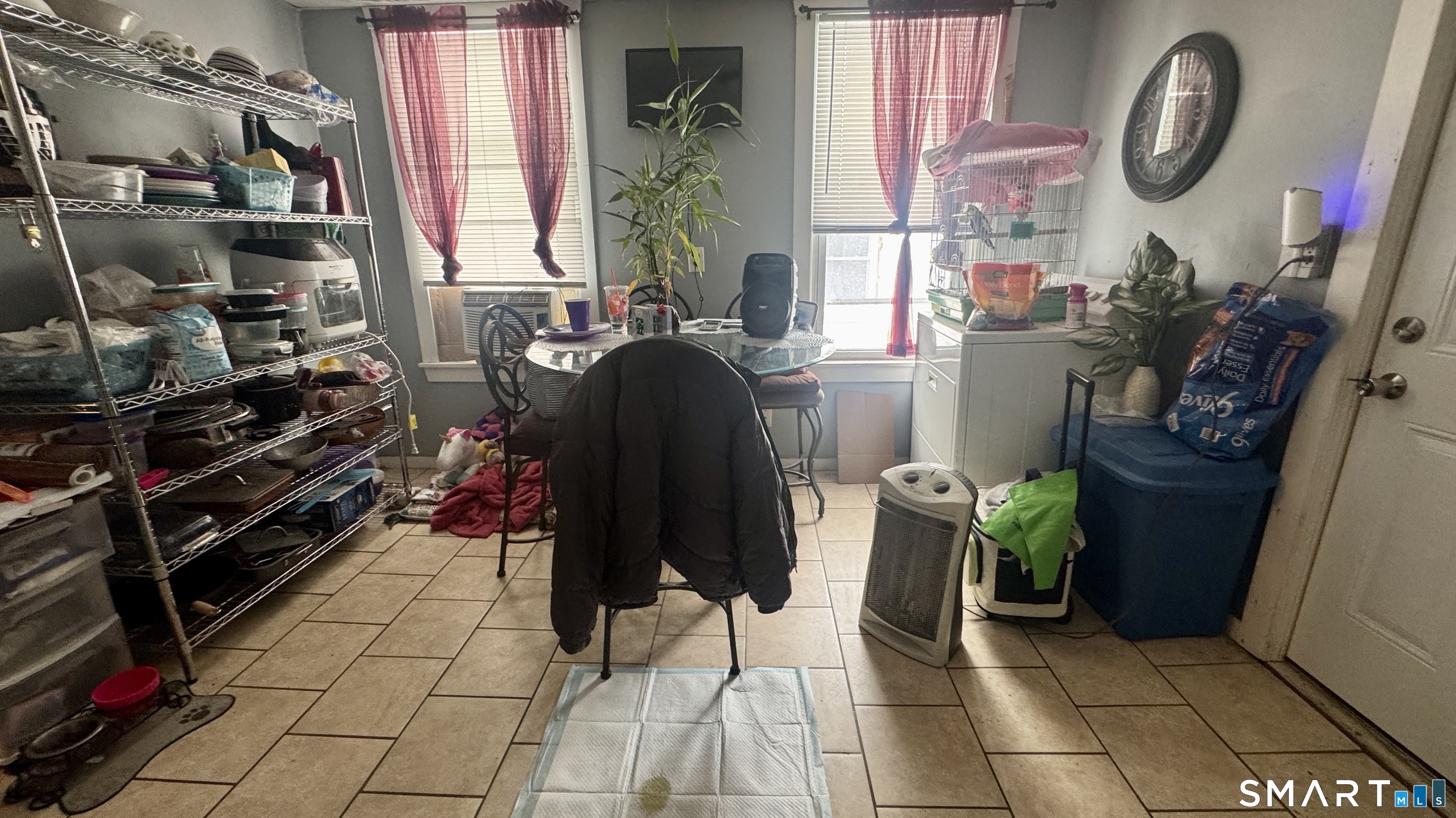 61 Randolph Avenue Meriden, CT 06451 - Photo 17 of 40 a room with furniture and a fireplace