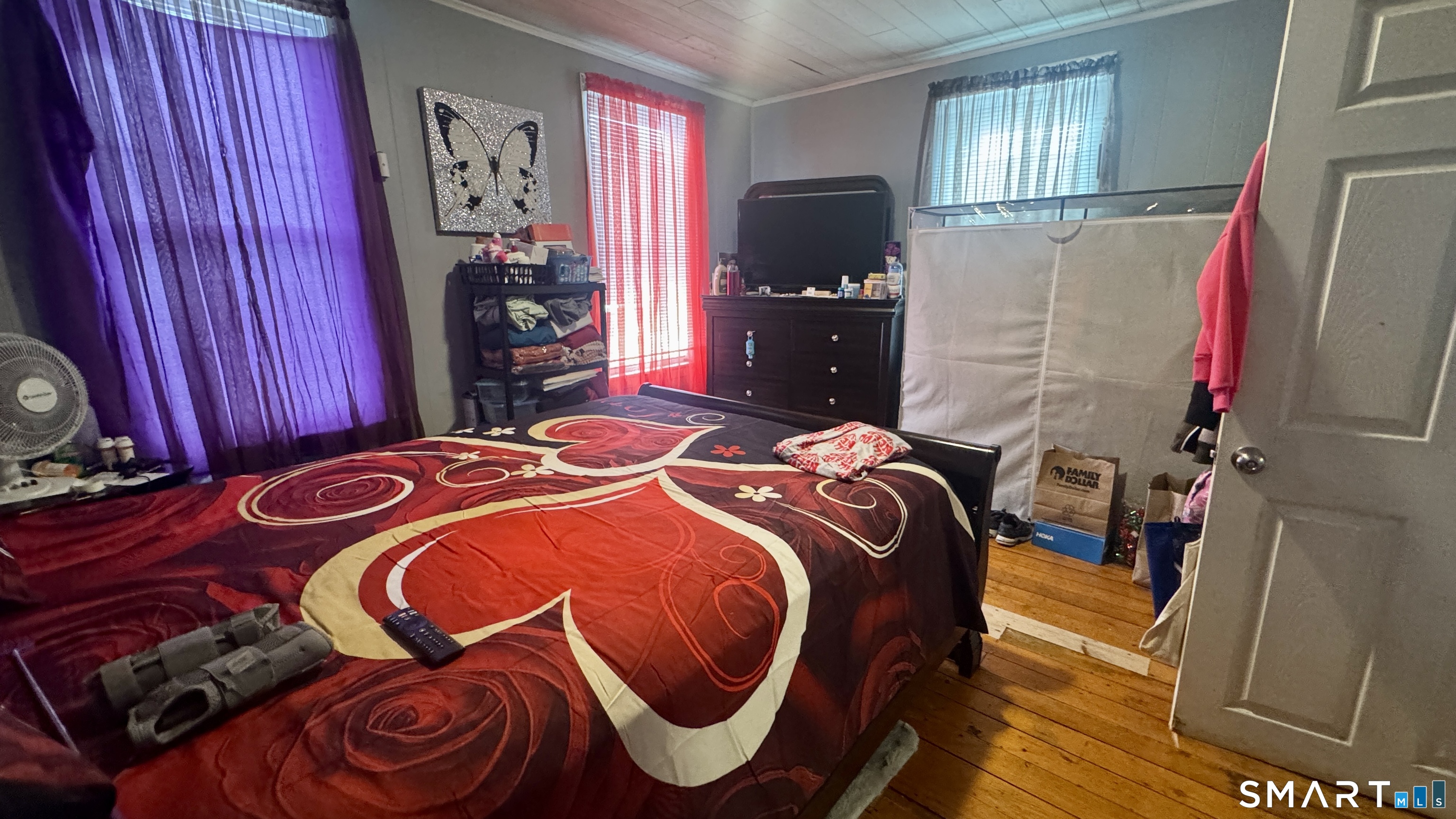 61 Randolph Avenue Meriden, CT 06451 - Photo 22 of 40 a bedroom with a bed and a flat tv screen