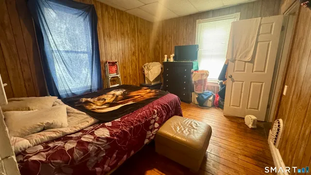 a living room with lots of furniture and a gym equipment