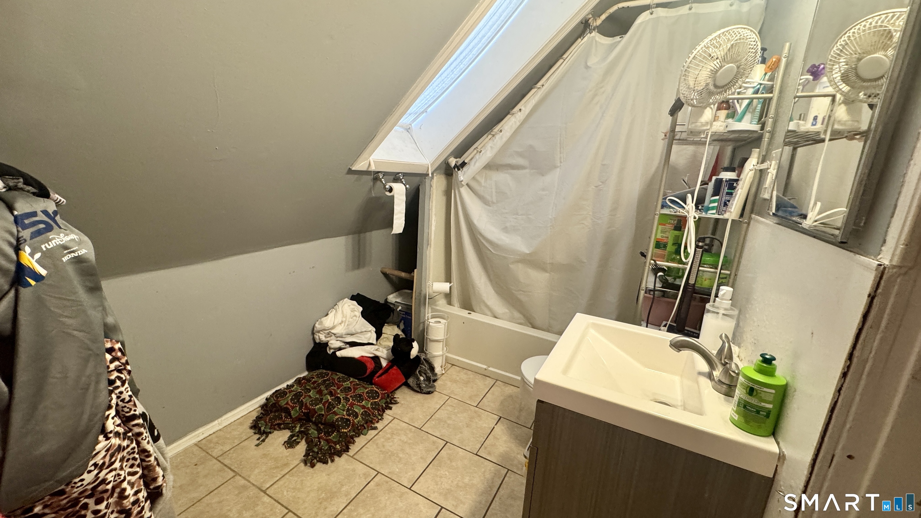 61 Randolph Avenue Meriden, CT 06451 - Photo 28 of 40 a bath room with a mirror