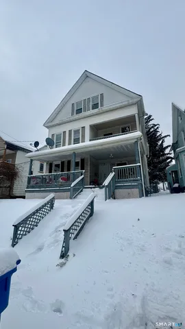 a view of a house with a roof deck
