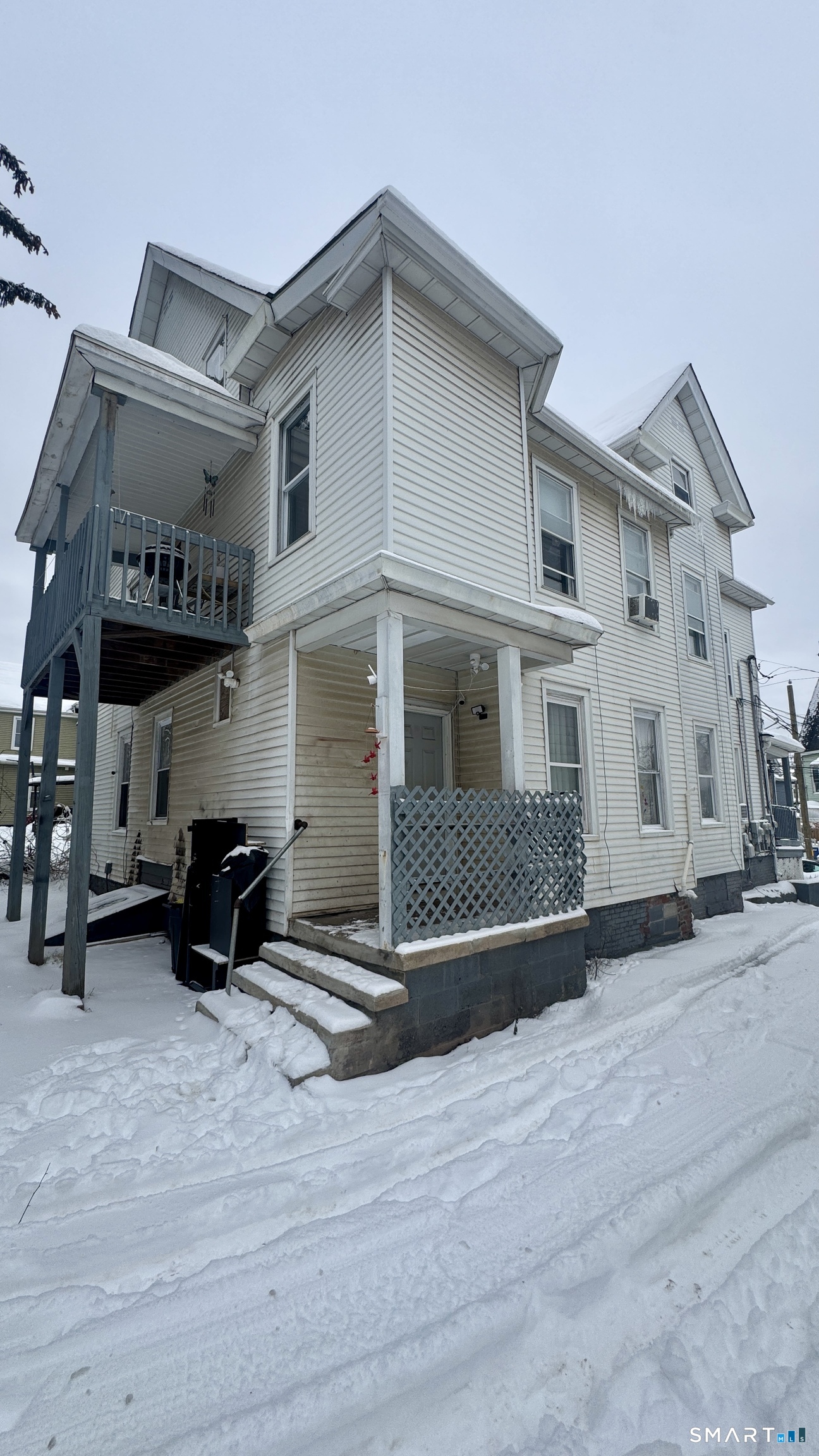 61 Randolph Avenue Meriden, CT 06451 - Photo 5 of 40 a view of a car park in front of house