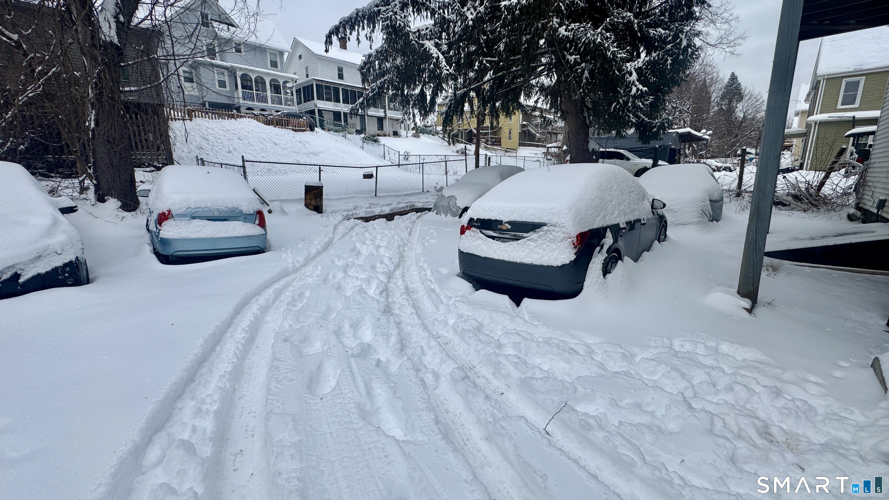 61 Randolph Avenue Meriden, CT 06451 - Photo 8 of 40 a car parked on the side of the road