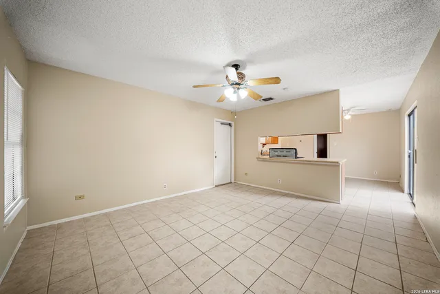 a view of a kitchen with marble kitchen and sink