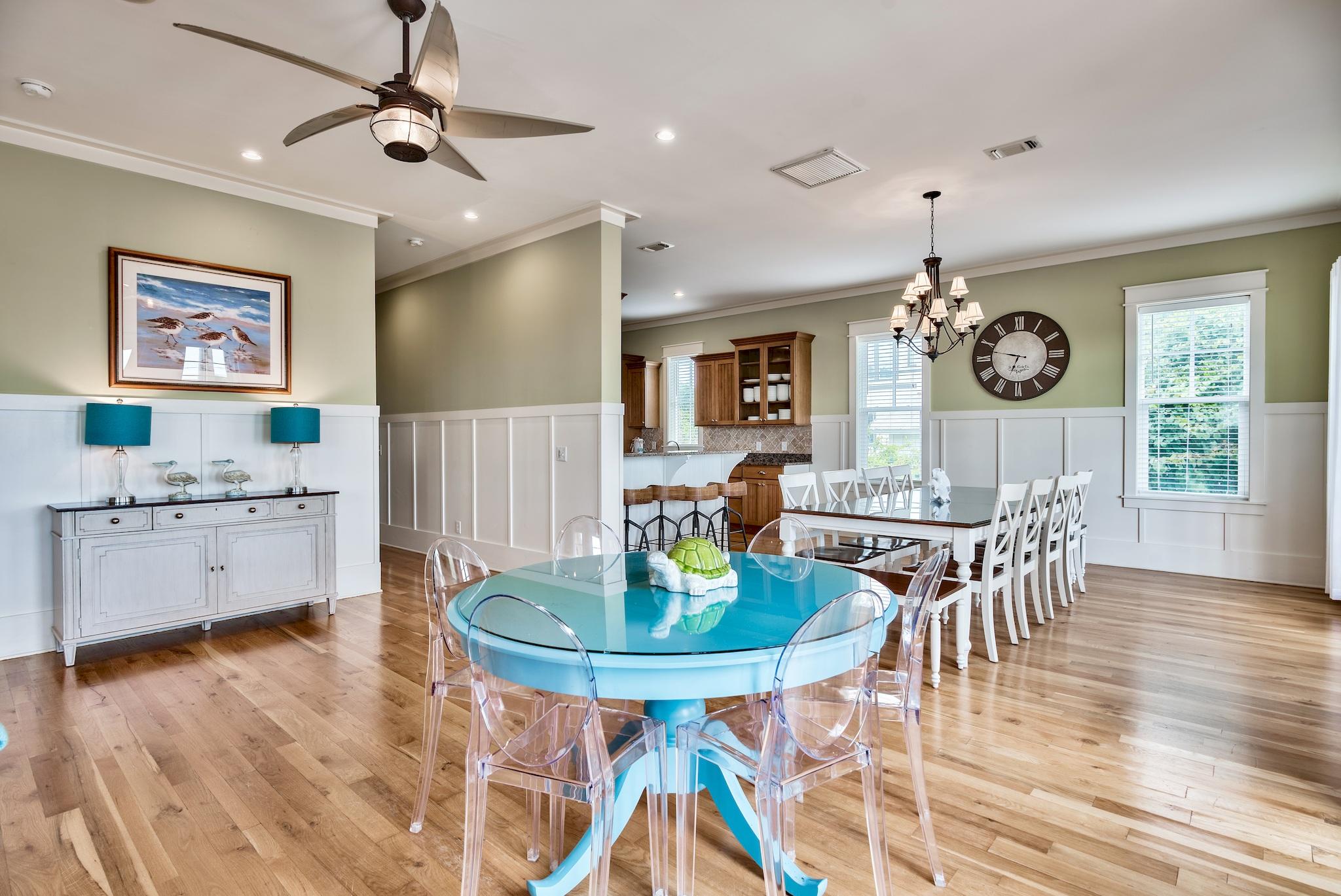 8045 East County Highway 30A Inlet Beach, FL 32461 - Photo 16 of 38 a view of a dining room with furniture and wooden floor