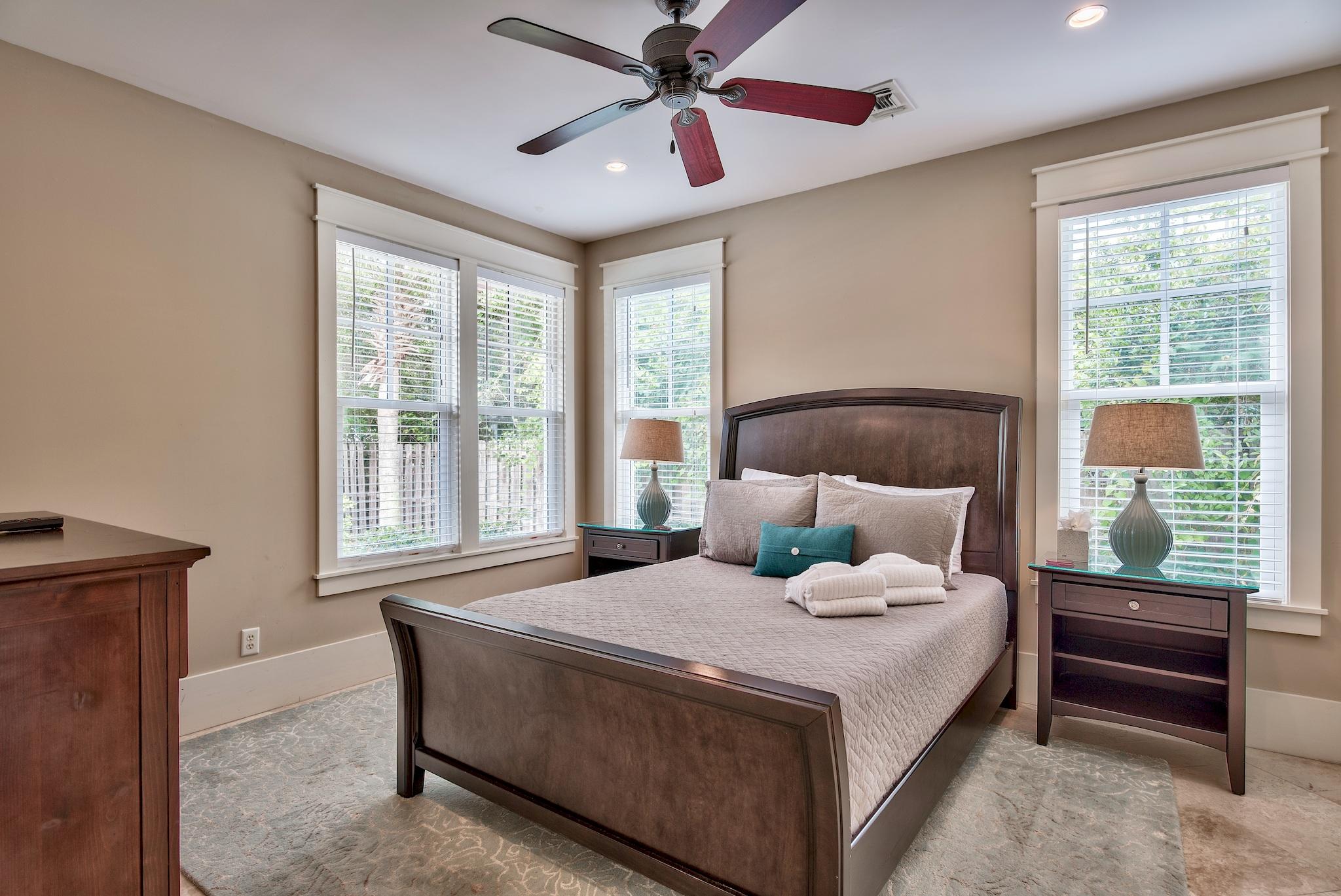 8045 East County Highway 30A Inlet Beach, FL 32461 - Photo 19 of 38 a bedroom with a large bed and a window