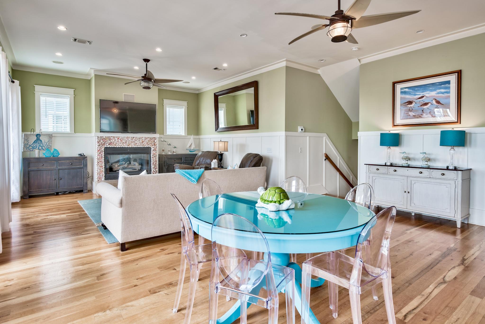8045 East County Highway 30A Inlet Beach, FL 32461 - Photo 25 of 38 a living room with furniture and a dining table with kitchen view