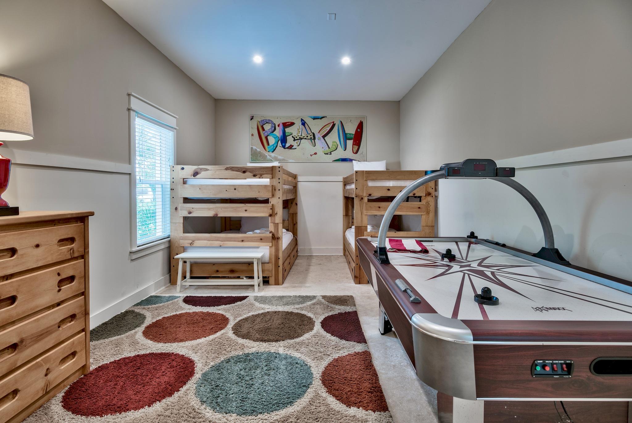 8045 East County Highway 30A Inlet Beach, FL 32461 - Photo 36 of 38 a bedroom with furniture and a mirror