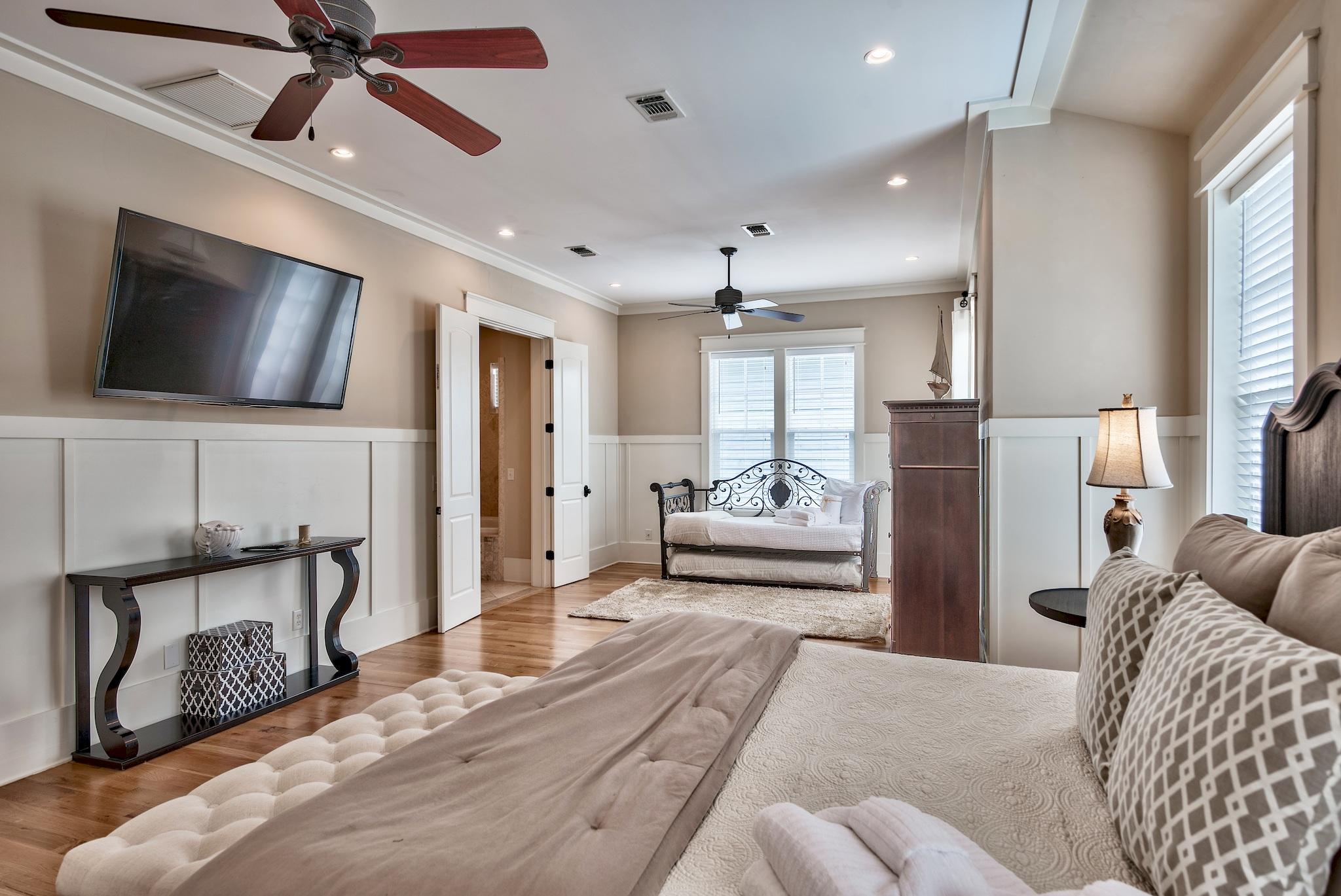 8045 East County Highway 30A Inlet Beach, FL 32461 - Photo 37 of 38 a bedroom with furniture and a flat screen tv