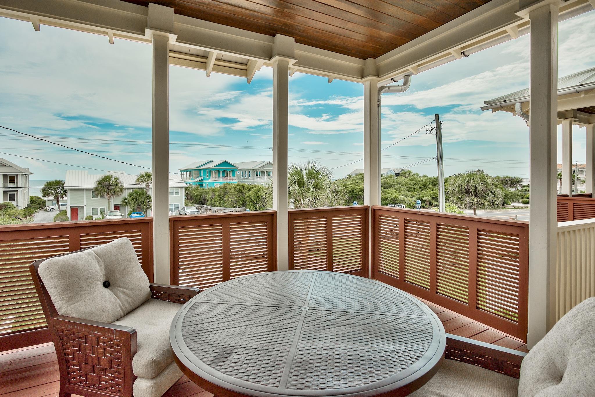 8045 East County Highway 30A Inlet Beach, FL 32461 - Photo 38 of 38 a view of a porch with furniture