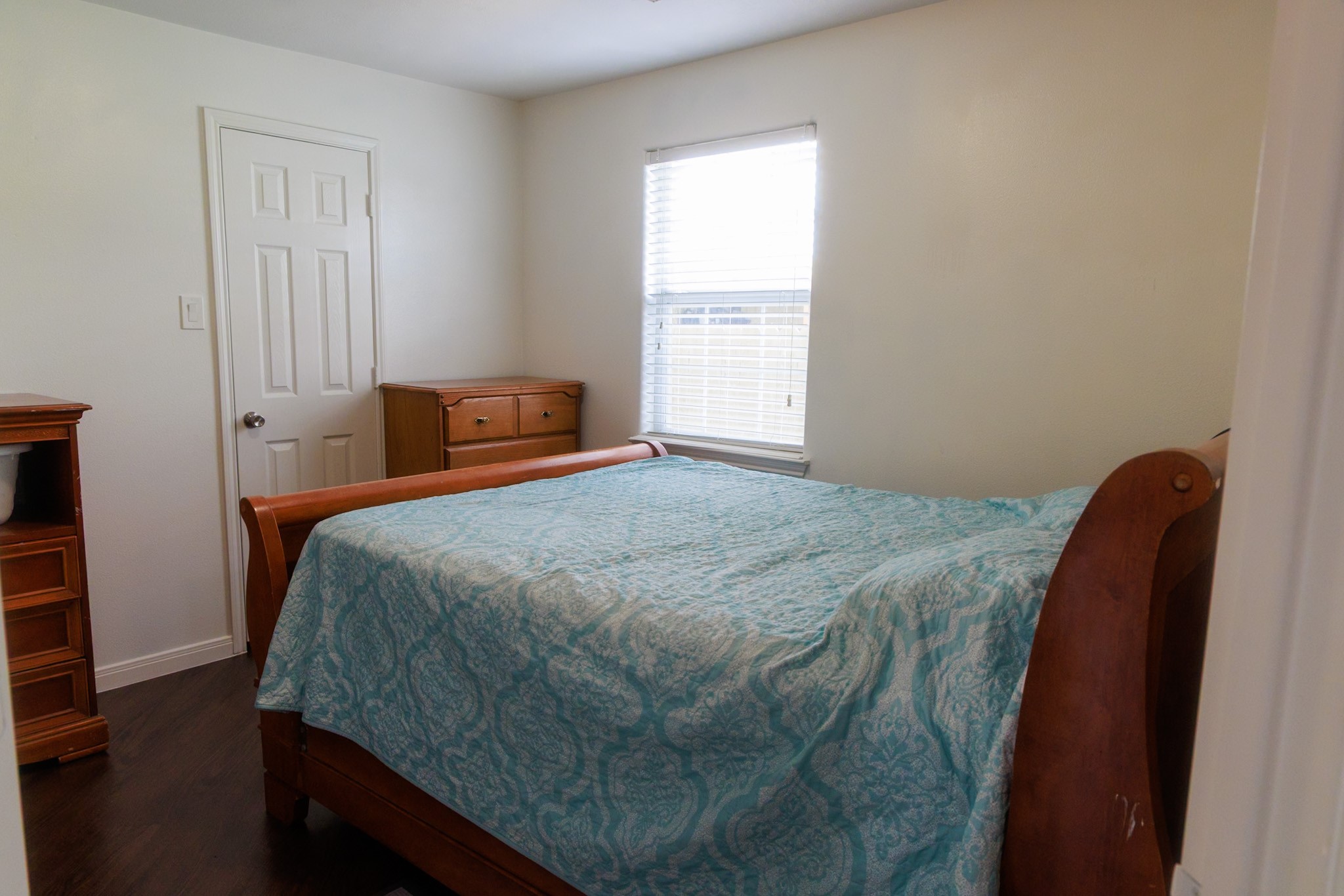 14334 Texarkana Street Houston, TX 77015 - Photo 12 of 26 a bedroom with a bed and a window