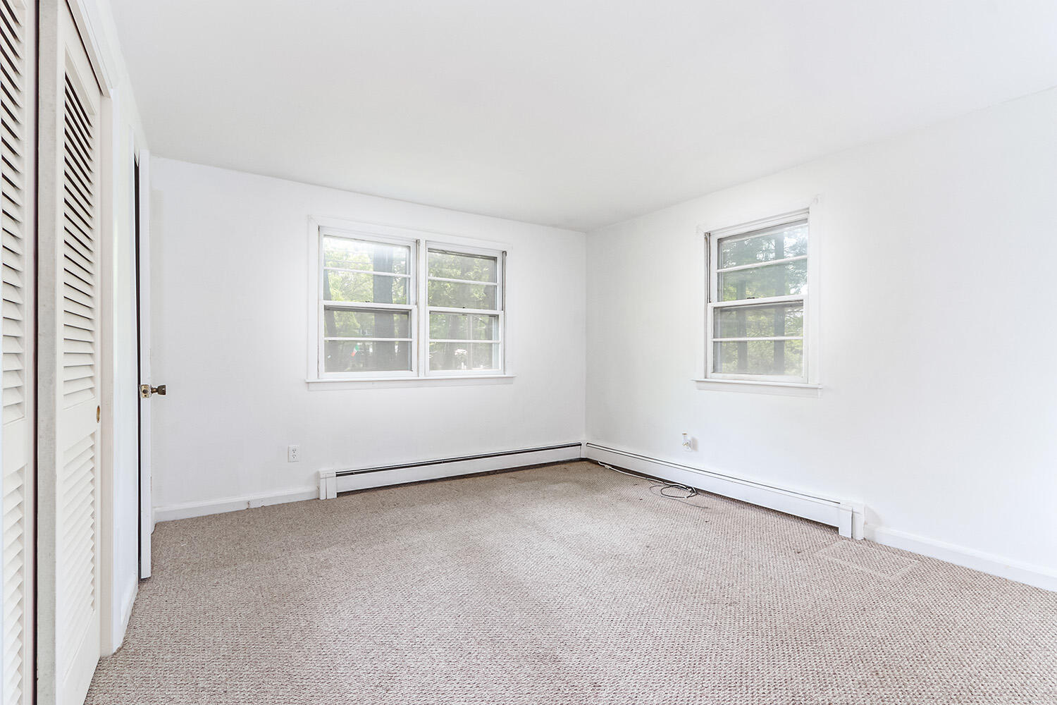 882 Bumps River Road Centerville, MA 02632 - Photo 13 of 23 an empty room with windows