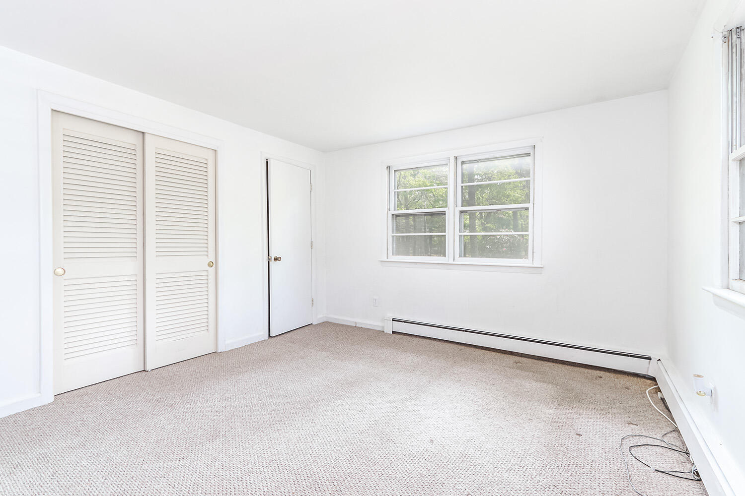 882 Bumps River Road Centerville, MA 02632 - Photo 15 of 23 an empty room with windows