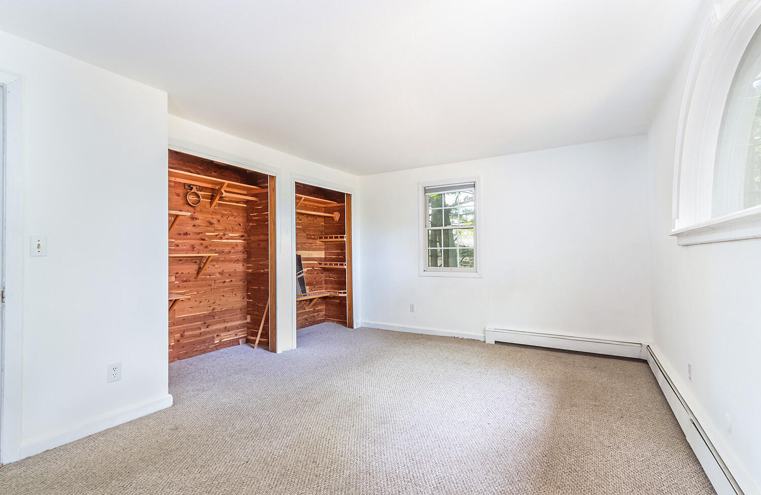 882 Bumps River Road Centerville, MA 02632 - Photo 17 of 23 an empty room with furniture and closet