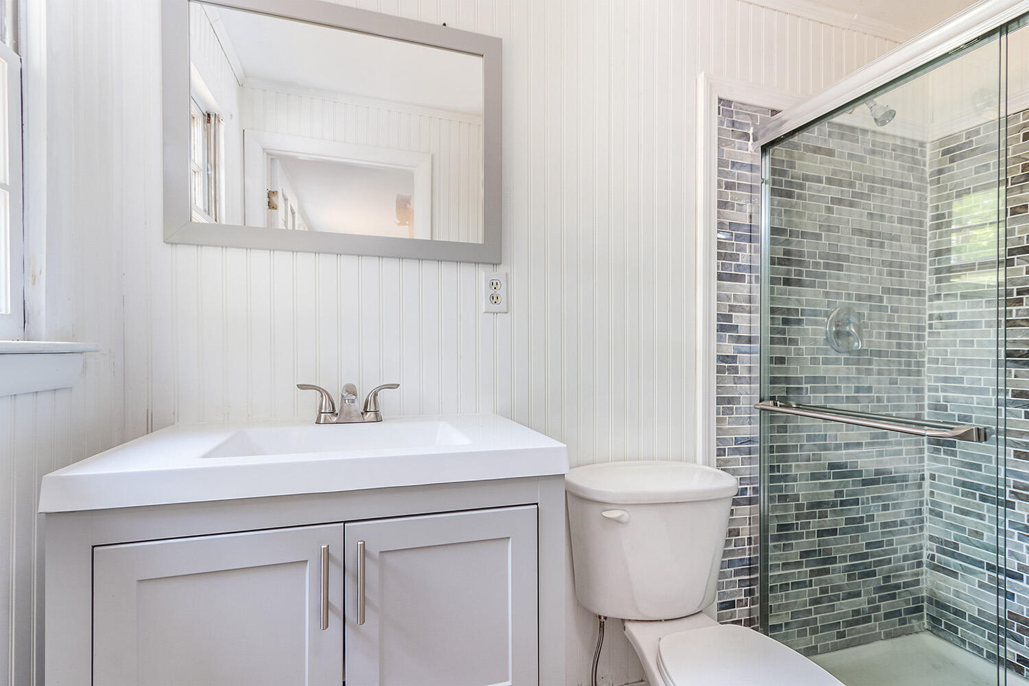 882 Bumps River Road Centerville, MA 02632 - Photo 19 of 23 a bathroom with a toilet sink and mirror