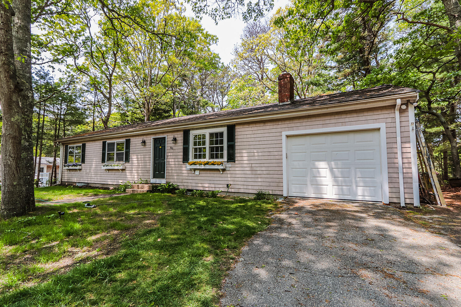 882 Bumps River Road Centerville, MA 02632 - Photo 3 of 23 a view of a house with a yard