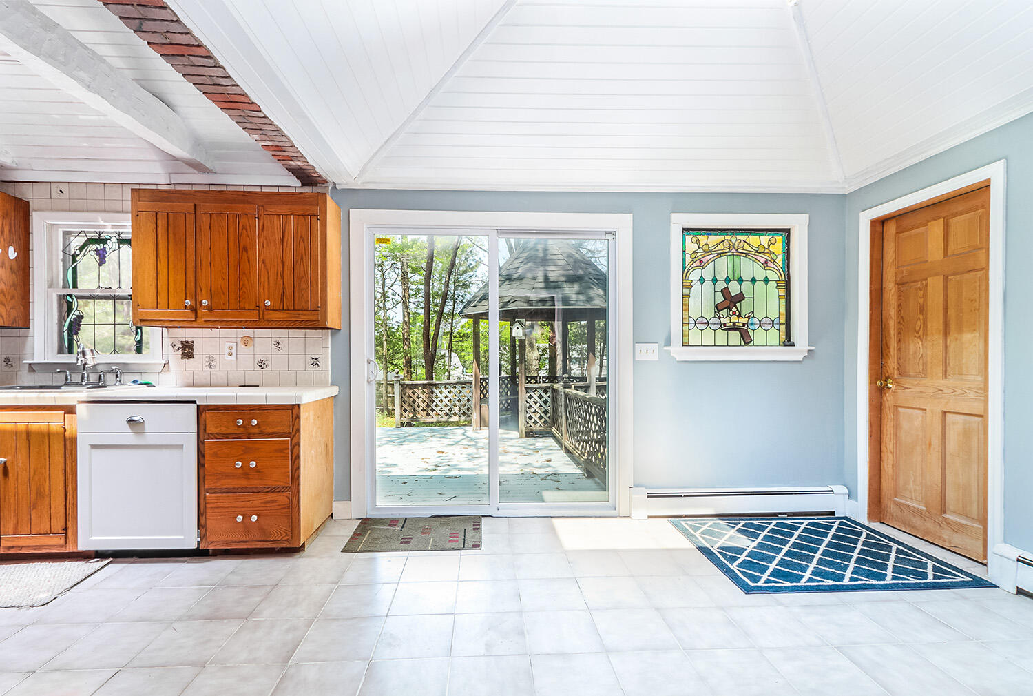 882 Bumps River Road Centerville, MA 02632 - Photo 7 of 23 a spacious bathroom with a vanity a sink and a large mirror