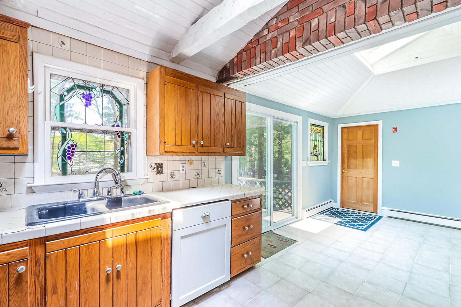 882 Bumps River Road Centerville, MA 02632 - Photo 8 of 23 a view of a kitchen with a sink and cabinets