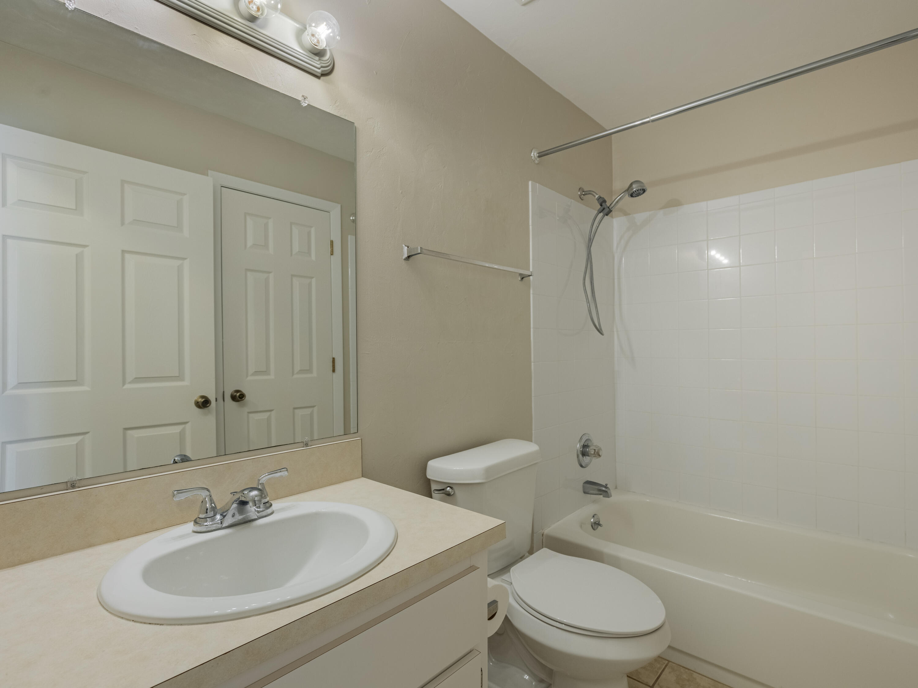 6367 Northwest 109th Place Alachua, FL 32615 - Photo 7 of 15 a bathroom with a sink toilet and shower