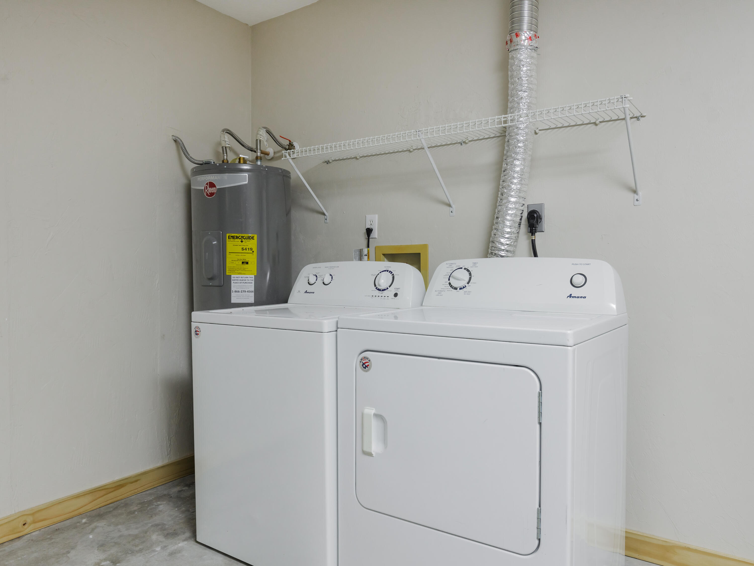 6367 Northwest 109th Place Alachua, FL 32615 - Photo 10 of 15 a utility room with dryer and washer