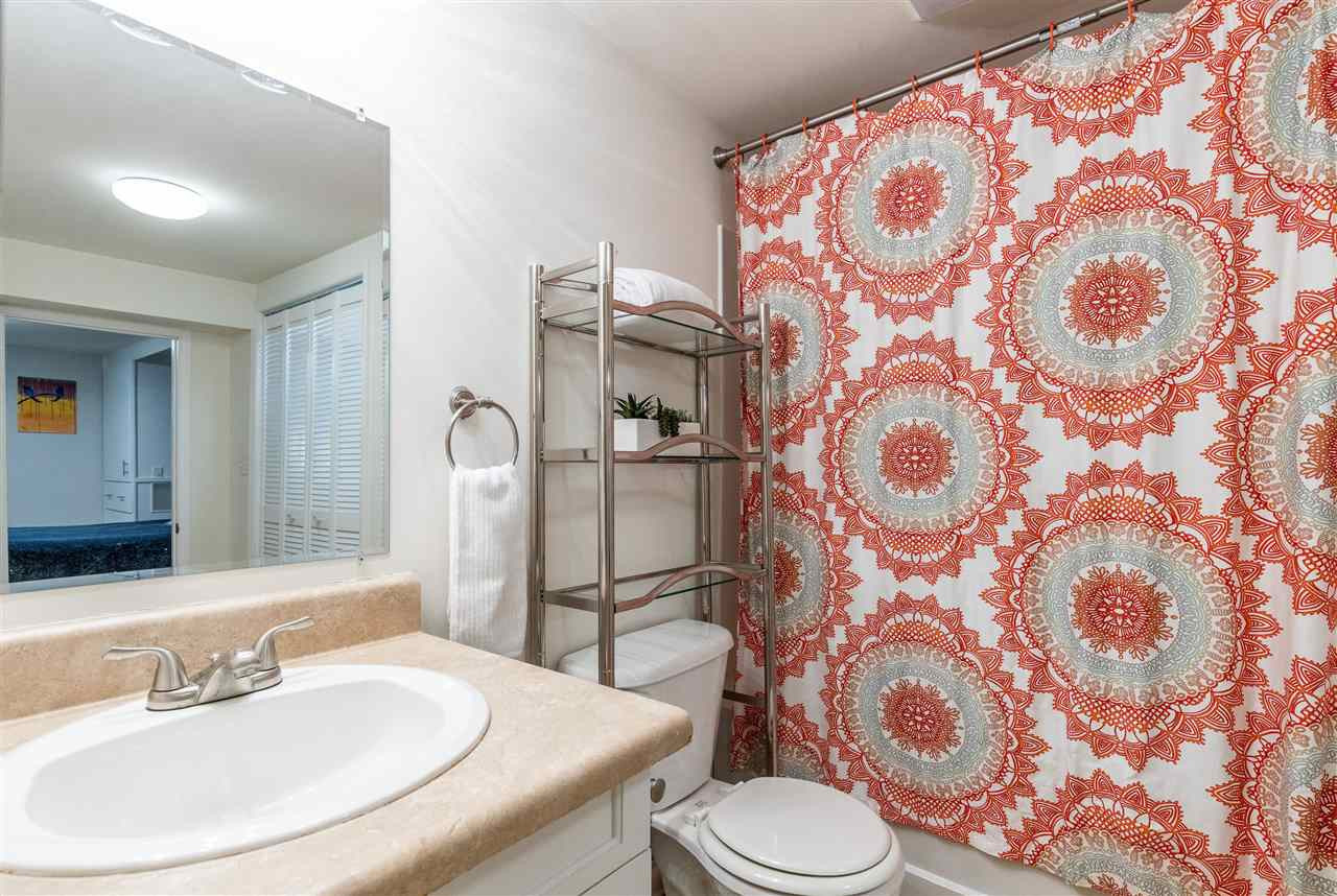 103 Crest Road Cary, NC 27513 - Photo 22 of 30 Tub/shower combo, laundry area, easy access to utility storage area. Master bath