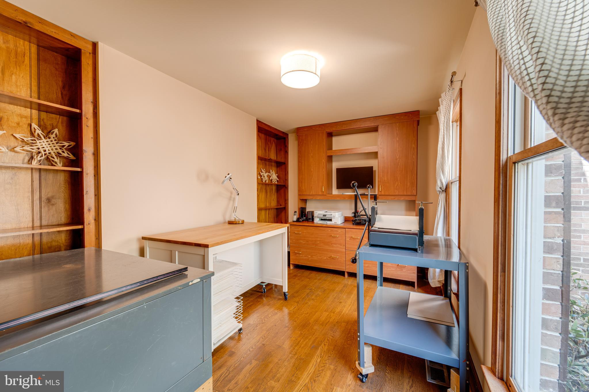 8232 Honeysuckle Road Manassas, VA 20112 - Photo 26 of 76 a living room with furniture and a table