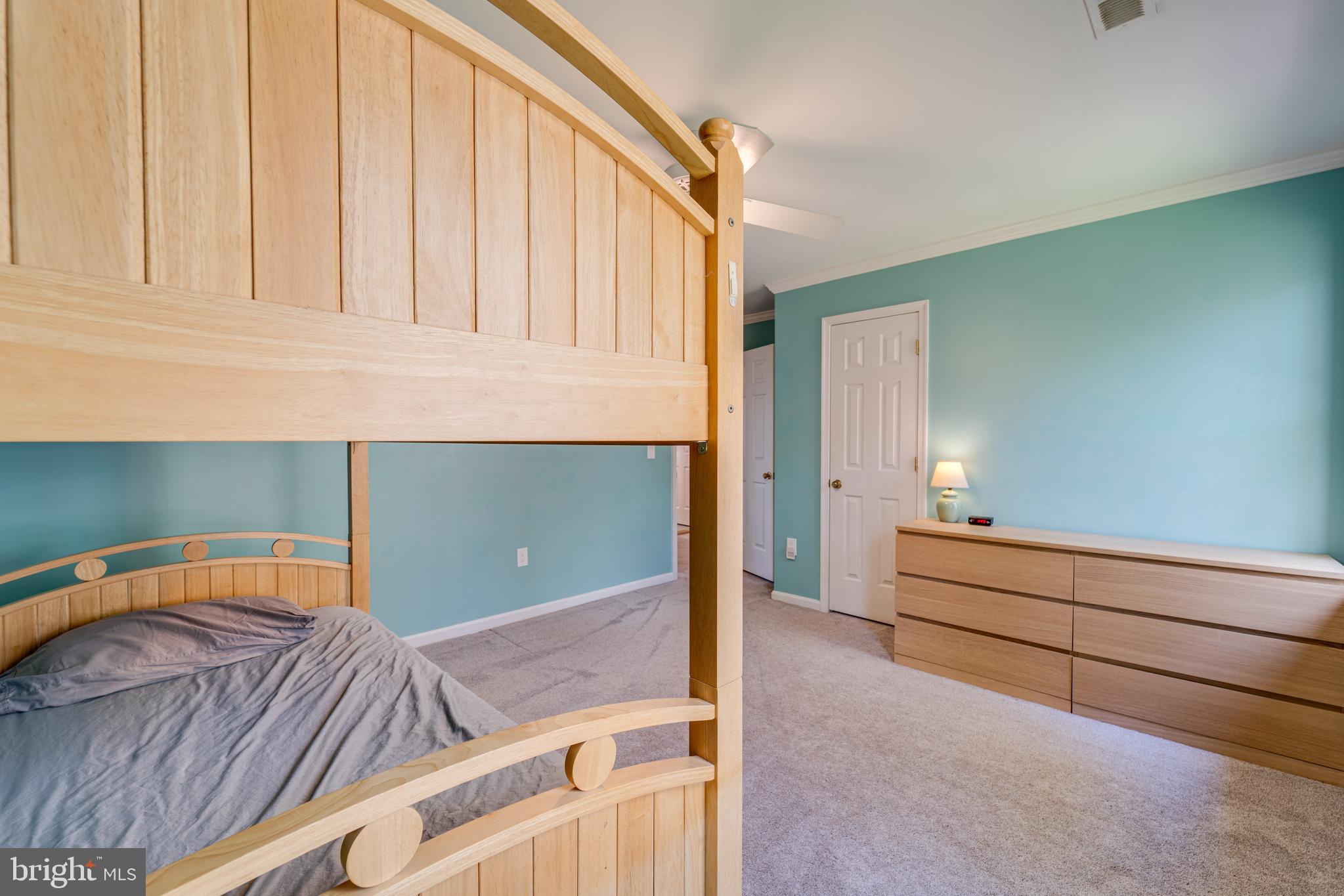 8232 Honeysuckle Road Manassas, VA 20112 - Photo 41 of 76 a bedroom with a bed and a window