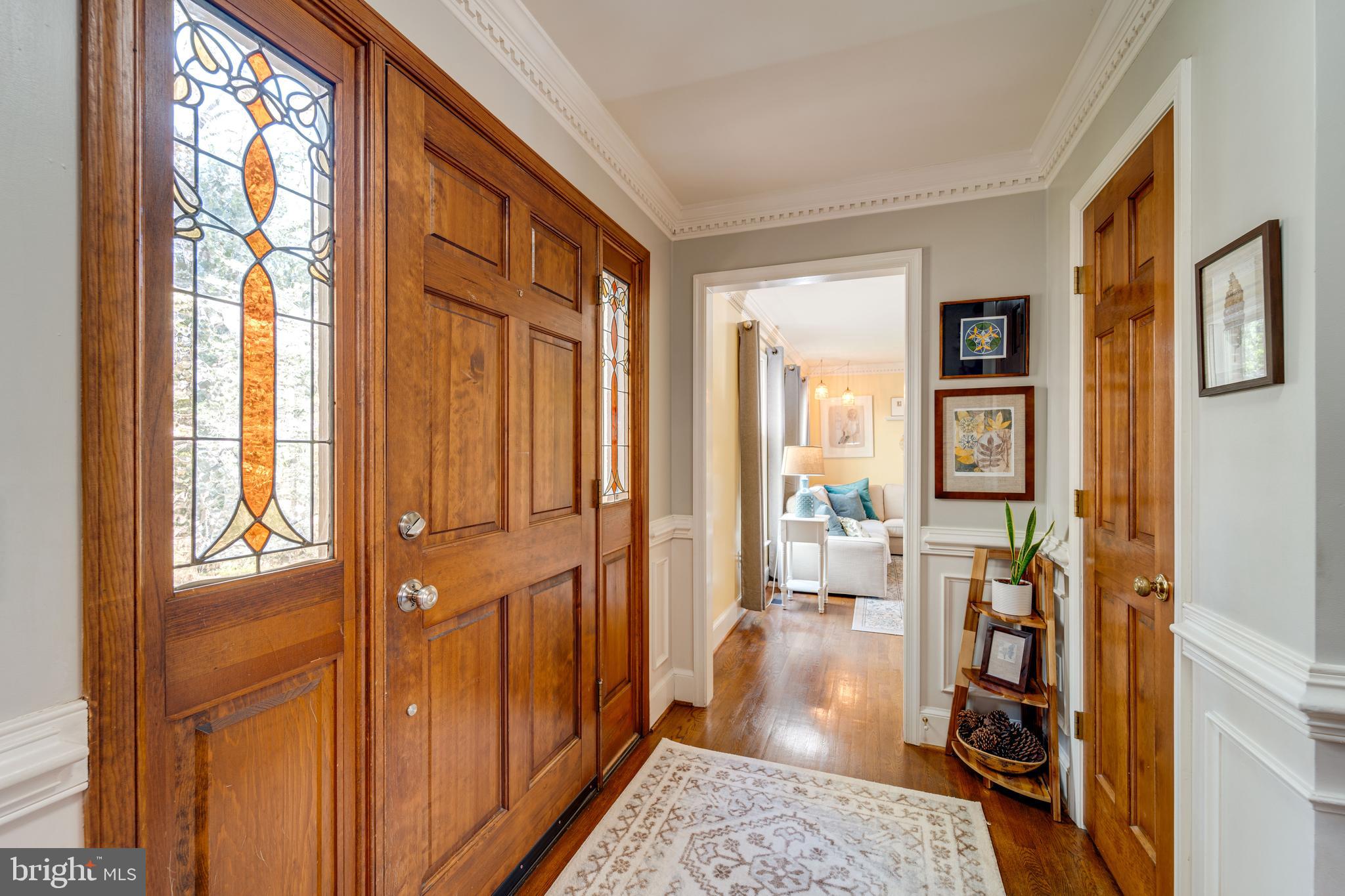 8232 Honeysuckle Road Manassas, VA 20112 - Photo 5 of 76 a living room with furniture and a fireplace