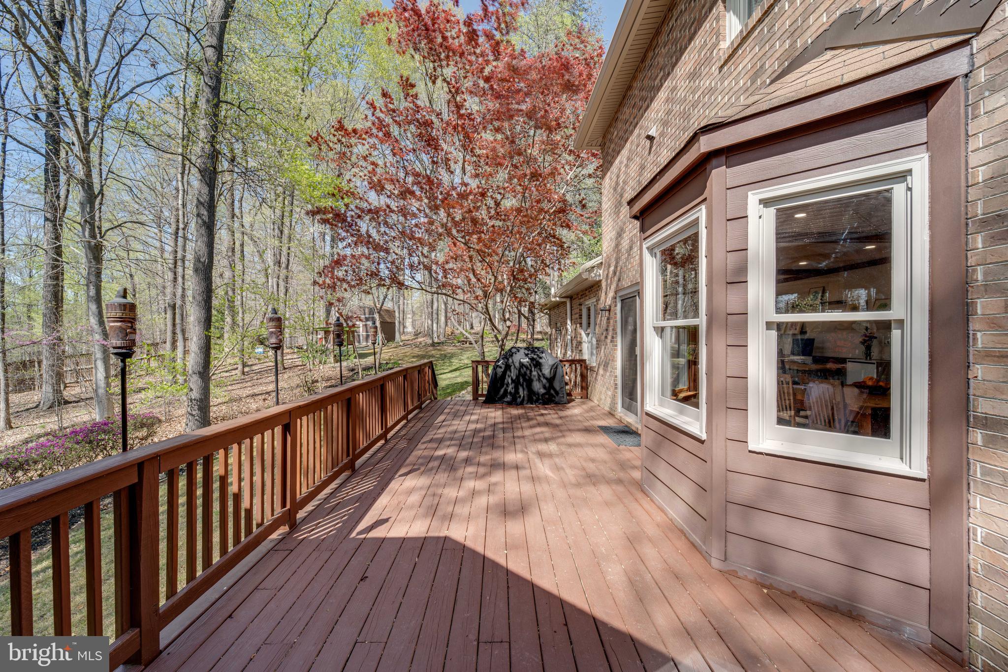 8232 Honeysuckle Road Manassas, VA 20112 - Photo 54 of 76 a view of a house with large windows