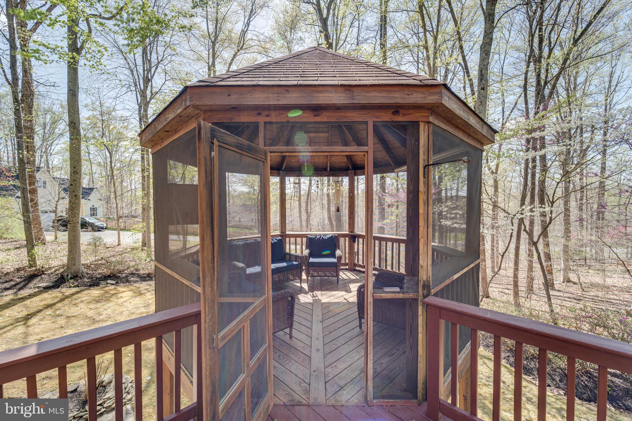 8232 Honeysuckle Road Manassas, VA 20112 - Photo 57 of 76 a front view of a house with outdoor seating